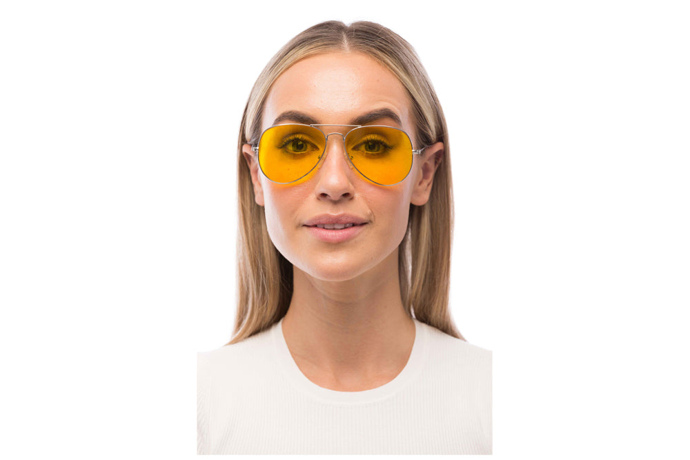 Woman Wearing Maverick Light Sensitivity Glasses Readers