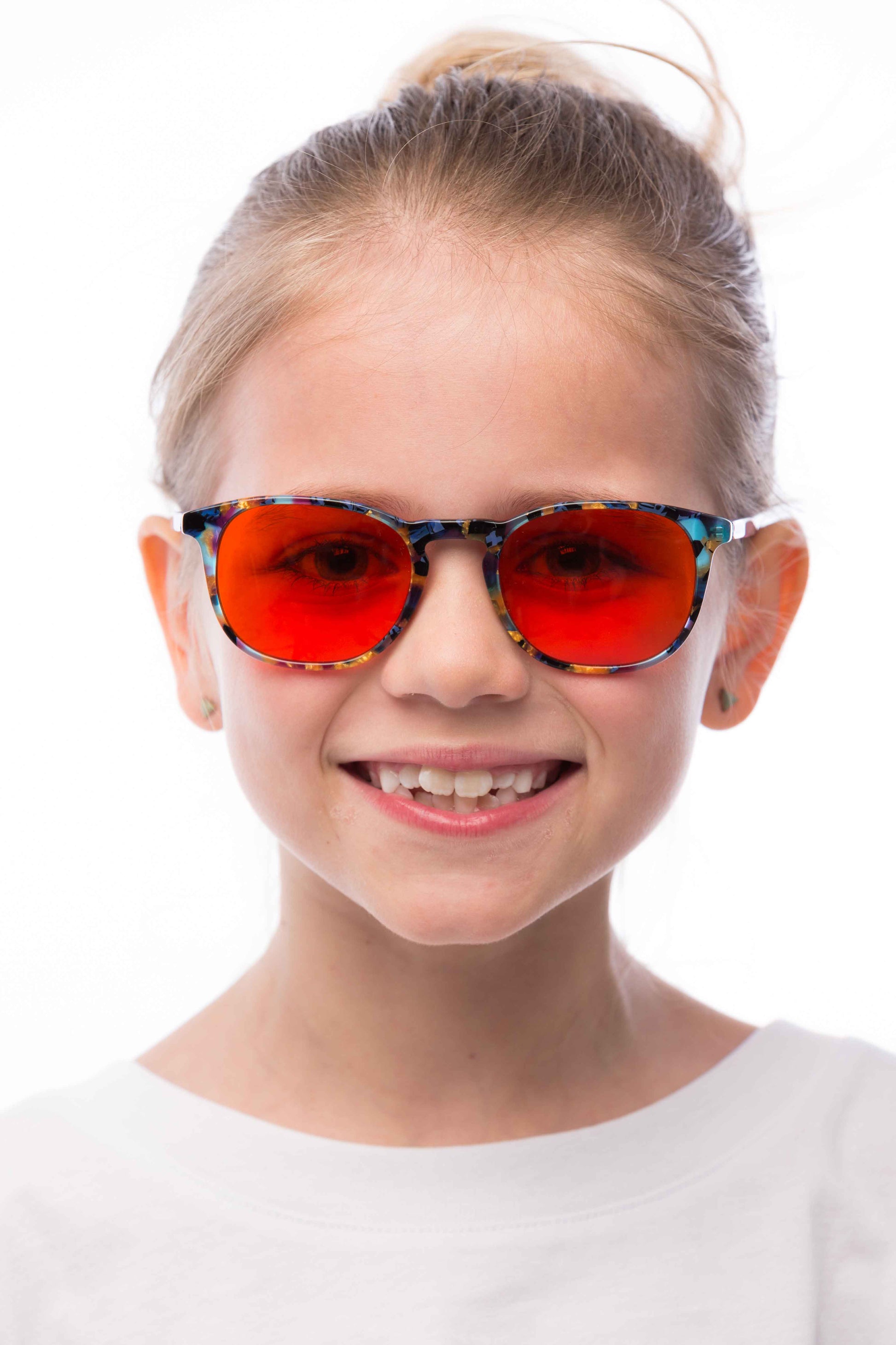 Girl Wearing Elsa Blue Light Blocking Glasses, angled view